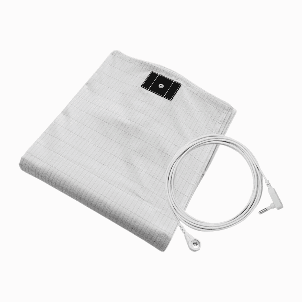 White electric blanket with control cable on a white background