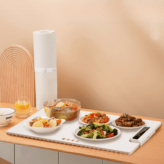Roll of paper towel on a table with food dishes