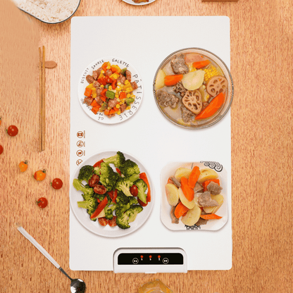 Heating mat with food items on a wooden surface